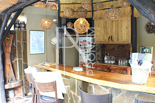 Enjoy the cool drink on a suburb outside  bar and having a chat with other guests