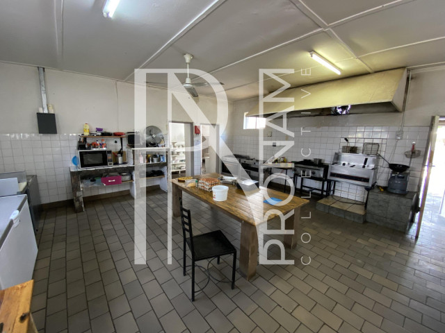 The kitchen is big enough to serve easy 60 or more people
