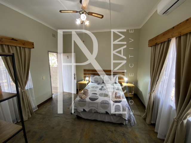 The bedroom for two with a queen size bed