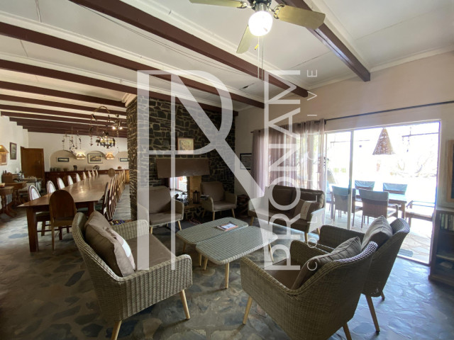 Lounge area in front of the massive fire place