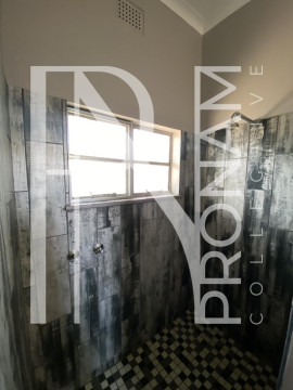 The shower with fancy modern tiles
