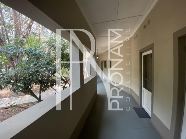 The covered path way to the rooms